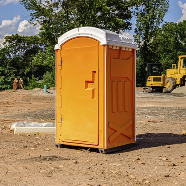 how often are the portable restrooms cleaned and serviced during a rental period in Gowen MI